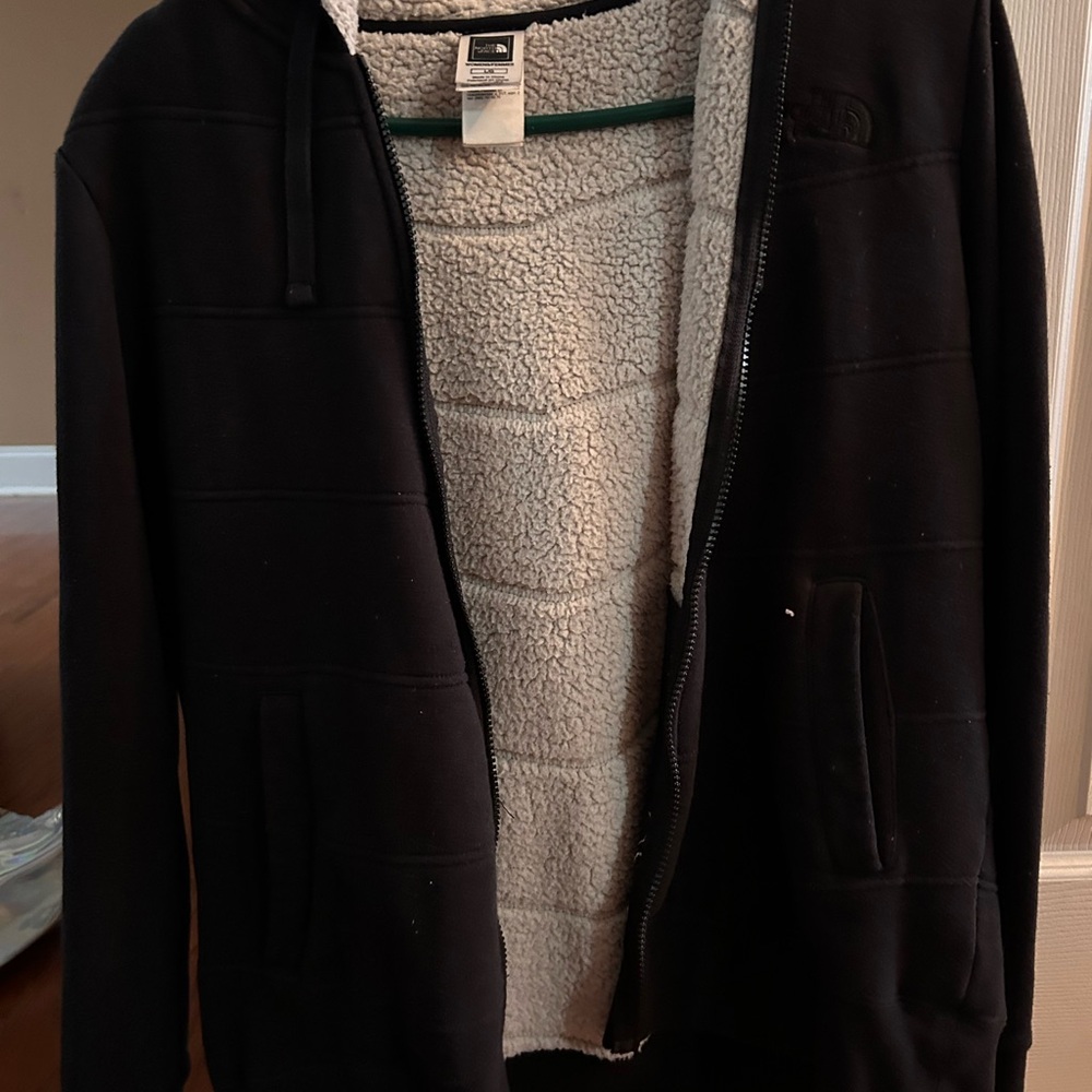 The North Face Black Zip Up Jacket with Cream Lining